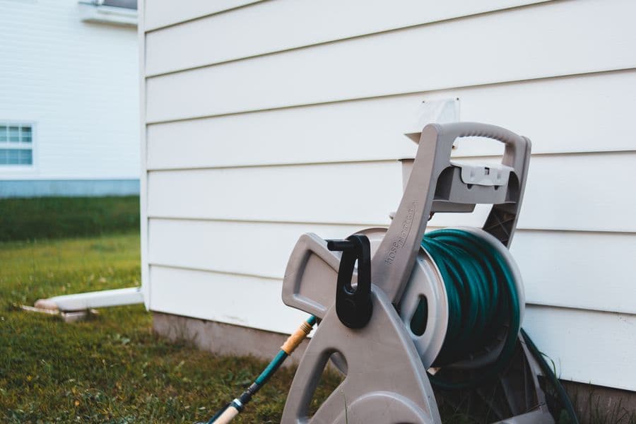 Clean house siding after soft washing