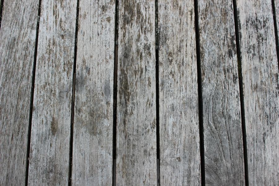 Weathered and stained wooden deck planks